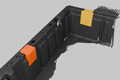 Dump bed mounting blocks installed in a Can-Am Defender bed